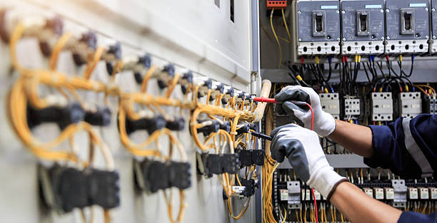 Professional Electrician technician working in Land O' Lakes, FL